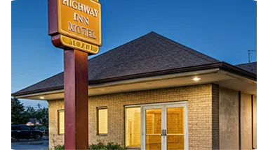 Owner, Highway Inn Motel storefront